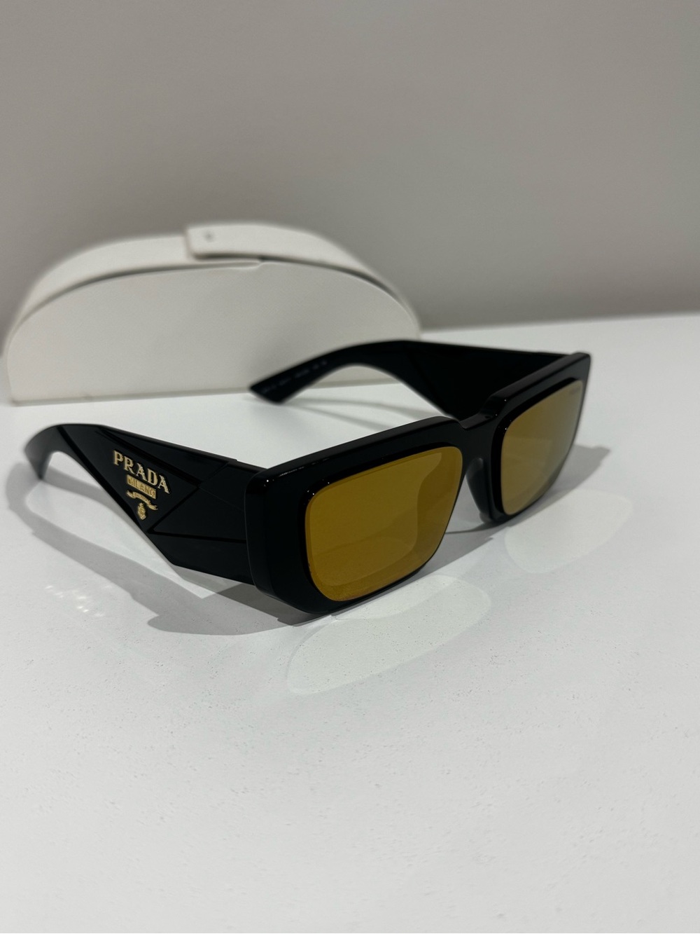 Prada Rectangular Black Sunglasses with Amber Lenses